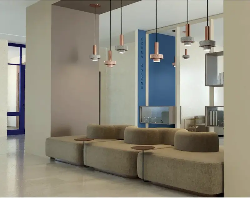 Lounge with blue accent wall and pendants