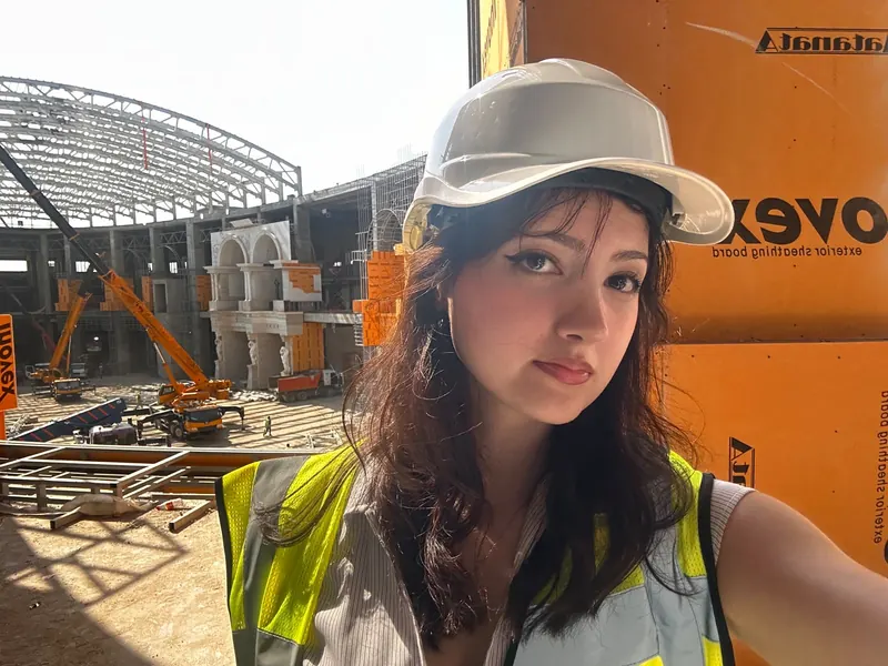 Asmar Ibrahimova reviewing a construction site